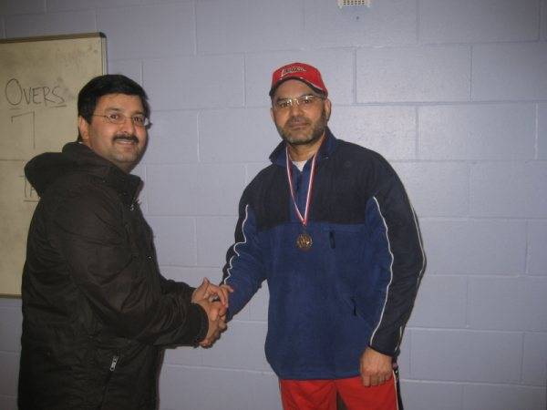 Quyyom of RYCC receiving Man of the match award from Shahid Jameel