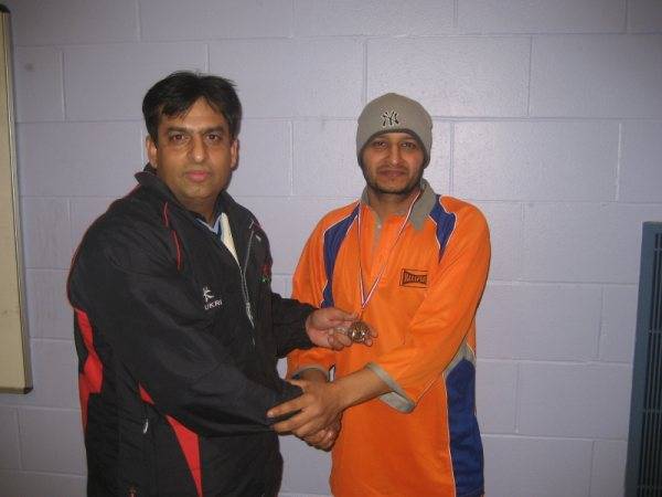 Tayab of Baba XI receiving man of the match award from M Siddique (one of the organisers of RPCL)