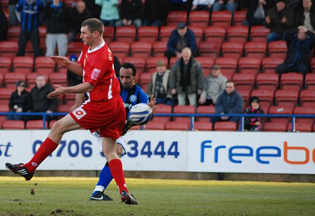 Chris O'Grady rifles Rochdale into the lead.