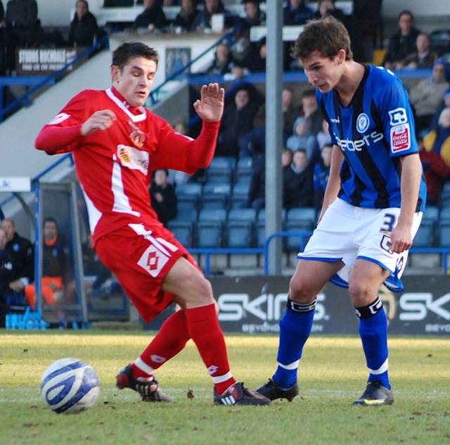 Atkinson picks a pass inside the Crewe penalty area.