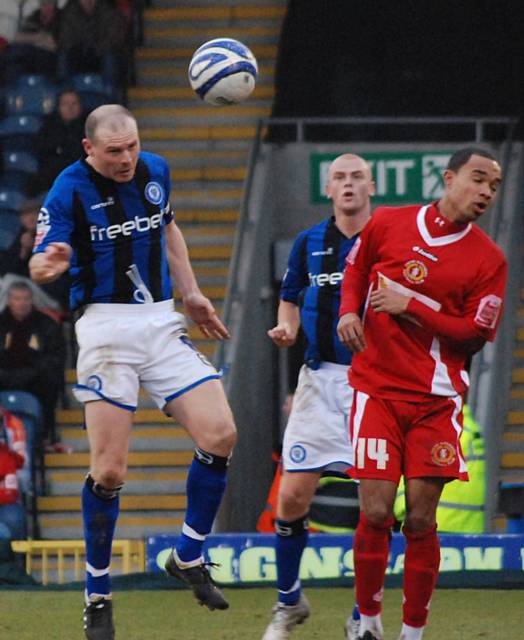 Jones wins a header.