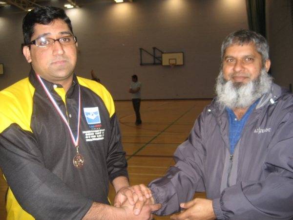 Zaheer of Max XI receiving man of the match award from Haji Zafar (RSCL playing committee member)