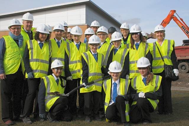 Front: Year 7 pupils from the school. 
Background: Councillor Keith Swift; Richard Parker - Chair of Governors; Deputy Head Darren Randle; Cheryl Eastwood - Director of Children’s Services; Gerry Hanson - Carillion Director; Claire Butler – General Manager Inspired Spaces Rochdale; and Councillor Irene Davidson.
