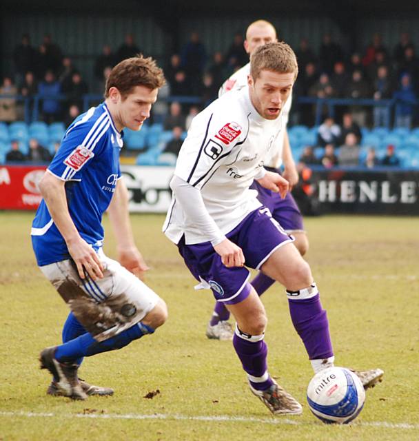 Tom Kennedy advances into the Rochdale box.