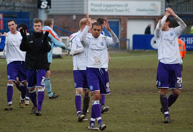 Dale players applaud the supporters at the final whistle.