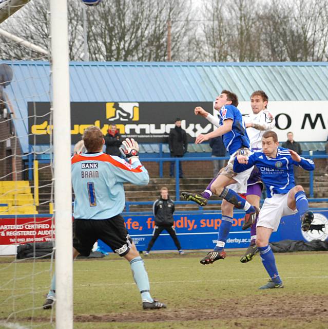 Craig Dawson heads over from a Dale corner.