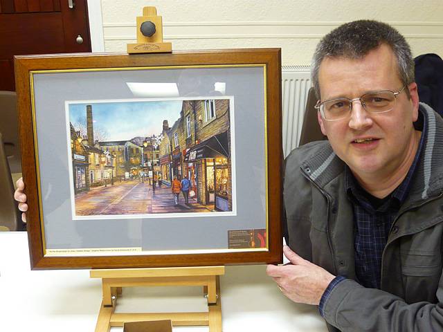 Local artist David Ainsworth with one of his paintings