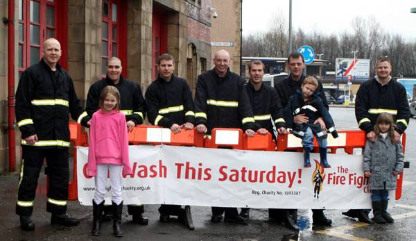 Firefighters put a shine back onto cars