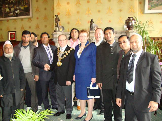 From L to R: Kuaz Ali, Abdun Noor, Abdur Rohim Ranju, Amir Ali (Chairman – Doulotpur Union, Sylhet, Bangladesh), The Mayor Cllr Keith Swift, Cllr Farooq Ahmed, The MAyores Sue Etchells, Simon Danzchuk, Boshir Ahmed, M. Dobir Miah,  & Muhibur Rahman 