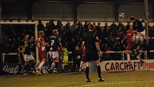 Craig Dawson rises highest to head Dale's third.