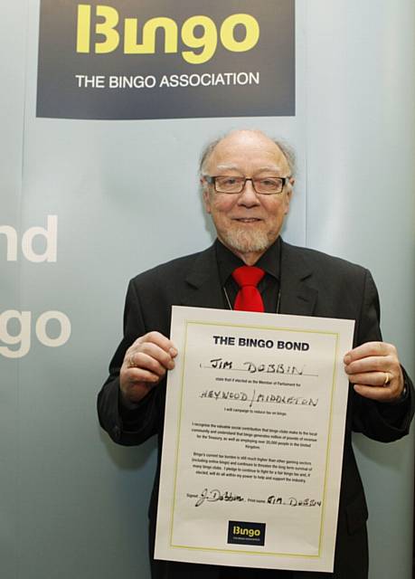 Jim Dobbin MP with his signed 'bingo bond'