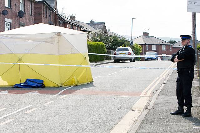 Police cordon and incident tent on Hurstead Road