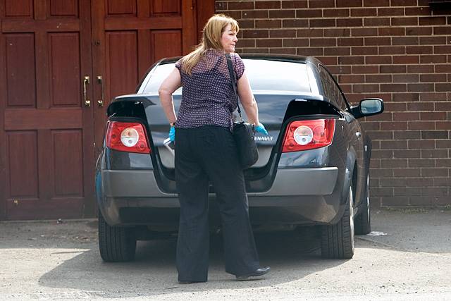 Police forensics officer outside Littleborough Cricket Club