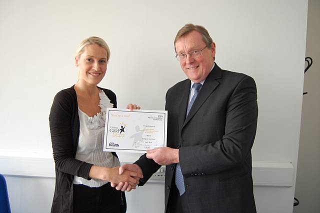 Commissioning winner Laura Hadfield pictured with NHS HMR Chairman John Pierce 

 
