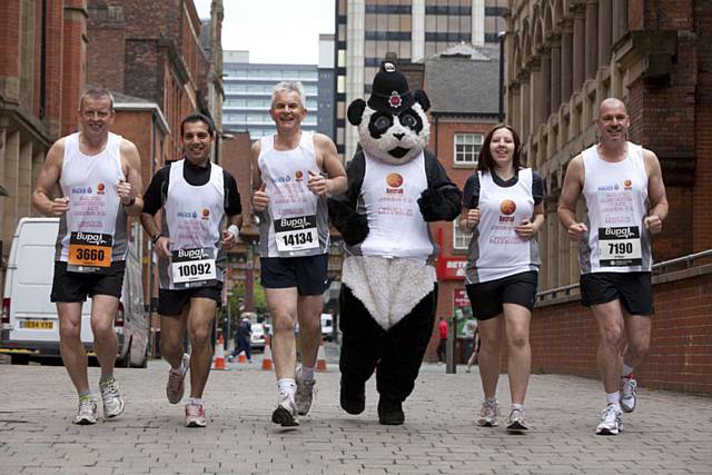 Chief Constable Peter Fahy raised  £365 for street children in Africa by going the distance at Sunday’s Great Manchester Run