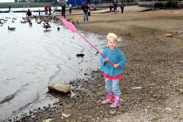 Ella Sharp, 3, from Whitefield playing by the water