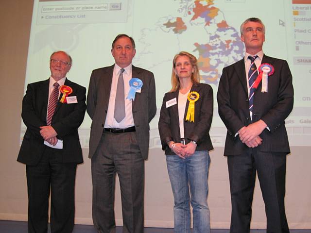 The parliamentary candidates stand on stage as results are read out. Left to right: Jim Dobbin MP, Michael Holly (C), Wera Hobhouse (LD) and Peter Greenwood (BNP)