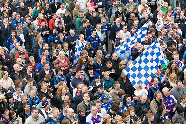 A crowd of thousands in the Town Centre to watch the Rochdale Football Club open top bus arrive at the Town Hall Civic Reception