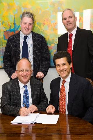 The council sign the contract with Sir Robert McAlpine. (Front: Rochdale Borough Council Chief Executive Roger Ellis, Mr Richard McAlpine. Back: Councillor Dale Mulgrew, Paul Walker, Project Manager.)

 
