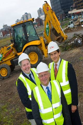 Work starts this month on the riverside site, ready for construction which begins next year. (Left to right: Councillor Dale Mulgrew, Chief Executive Roger Ellis and Mr Richard McAlpine.)

 

