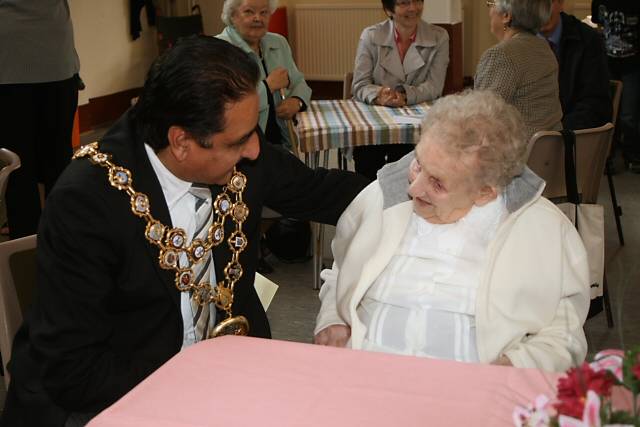 The Mayor of Rochdale, Councillor Zulfiqar Ali speaking to Millicent Stringer