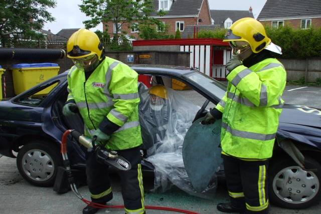 Two pupils took part in a “simulated car-crash” and cut them out using the equipment carried on fire engines