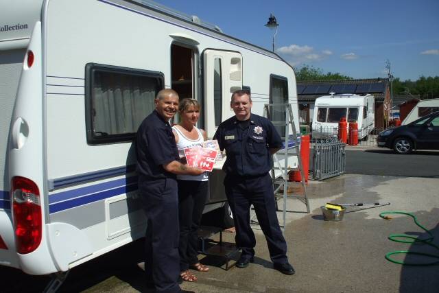 Community Fire Safety Officers, Mick Cryer and Gary Thomas with resident Mrs Locke 