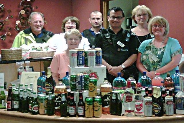 Officers deliver drinks for hospice residents