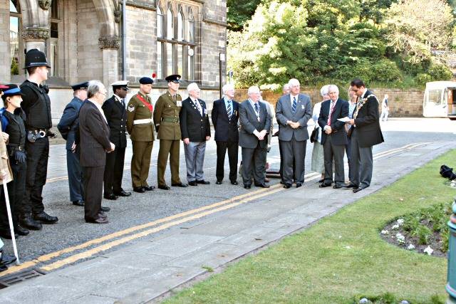 The Mayor of Rochdale, Councillor Zulfiqar Ali speaks to the small crowd about Armed Forces Day