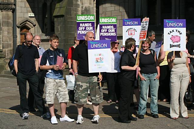 Protesters outside Rochdale Town Hall in 2010<br/> The result means there is likely to be a huge national strike on 30 November.