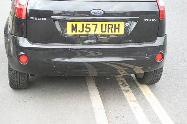 This Ford Fiesta has some damage to its rear end following the collision