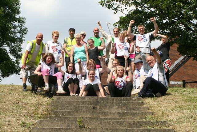 Volunteers celebrate the transformation