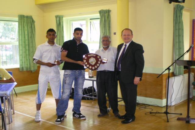 The winners, Sports For All collect their award from Councillor Sharif and MP Simon Danczuk