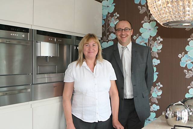 Lynda Brammall and Greig Adamson  in the showroom