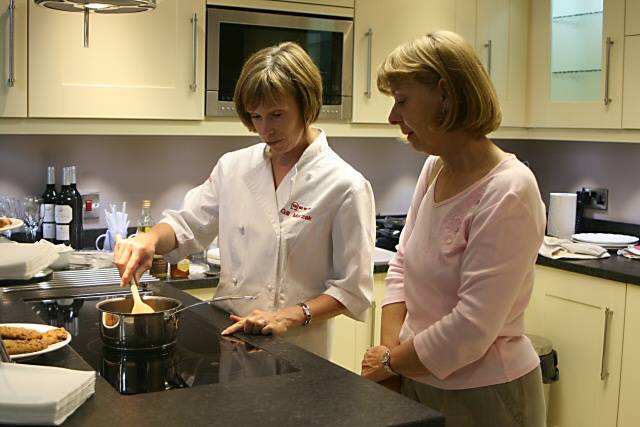 A potential customer enjoying the Neff cookery demonstration