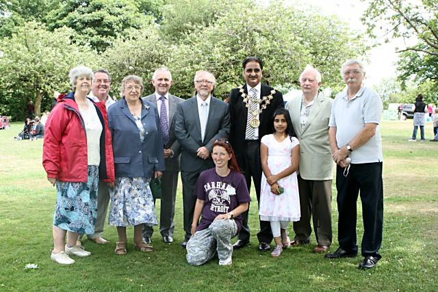 The Friends of Queen's Park, including Founder Shelia Hill, the Mayor of Rochdale, Councillor Zulfiqar Ali, MP Jim Dobbin and the Deputy Leader of Rochdale Council, Councillor Ashley Dearnley, on the group's 21st birthday