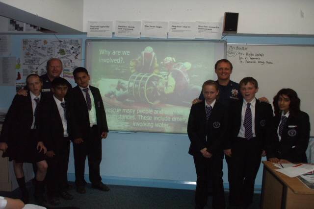 Community Fire Safety Officers Steve Ashworth with pupils from Falinge Park High School 