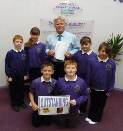 Headteacher Danny Mulkeen with pupils from Sandbrook Community Primary