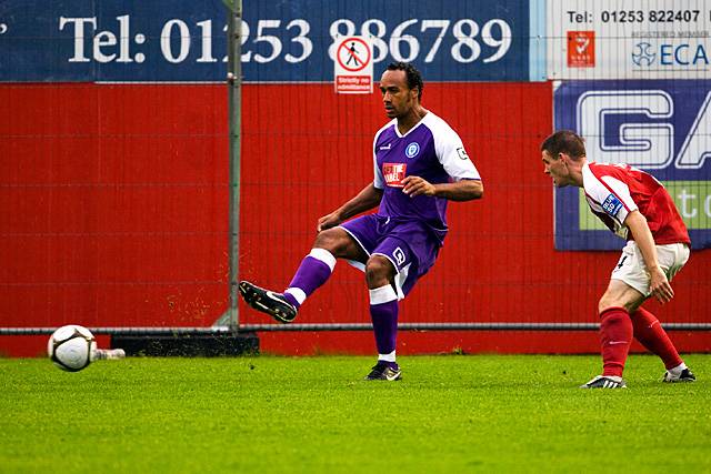 Fleetwood Town v Rochdale - Chris O'Grady closely watched by Anthony Barry