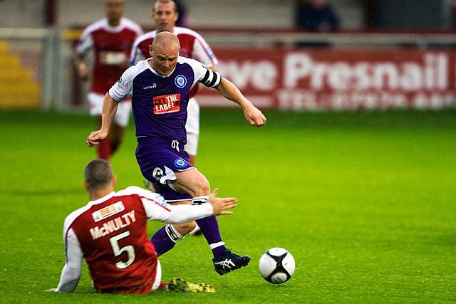 Fleetwood Town v Rochdale -  Gary Jones gets the better of McNulty