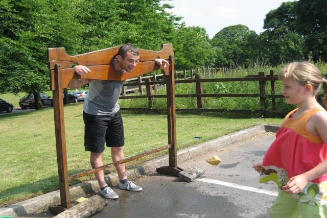 Fundraiser, Dean Connaughton, spent the day in the stocks at the Springhill Hospice summer gala in 2010