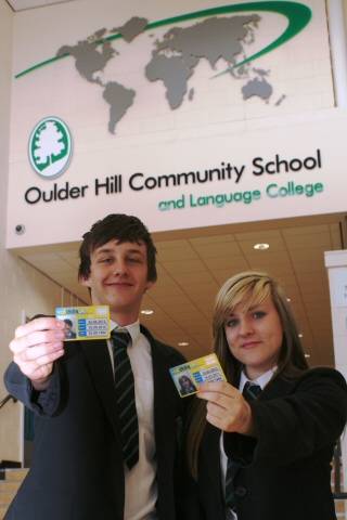 Connor Nolan and Catherine Ayres, both Year 10 pupils prove their age with their new ValidateUK identification cards
