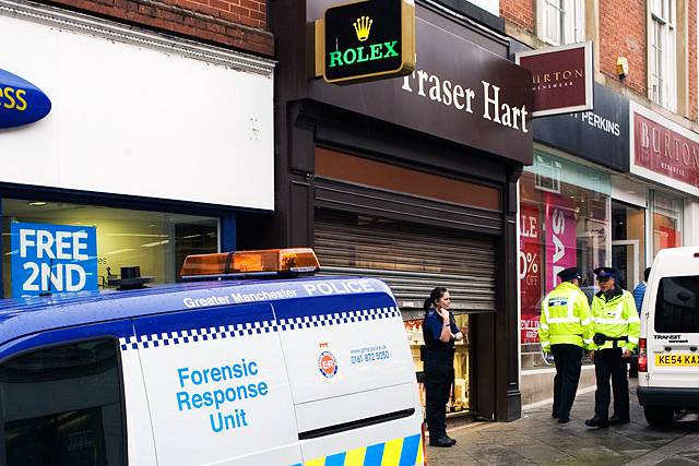 Police outside Fraser Hart Jewellers