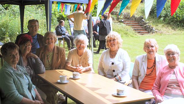 Rochdale Pensioners Association enjoying a cup of tea at the garden party held by CVS earlier this month