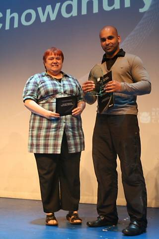 Volunteer of the Year Jaman Chowdhury collects his award from Kathy Shaw from the Council for Voluntary Services