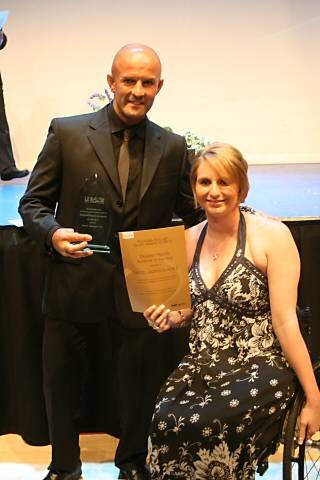 Disabled Sports Achiever of the Year Simon Jackson MBE receives his award from Heather Frederiksen