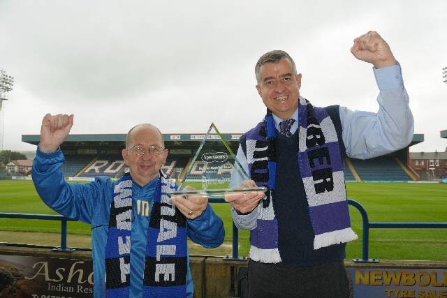 Kit man Jack Northover receives his award from Colin Bainbridge