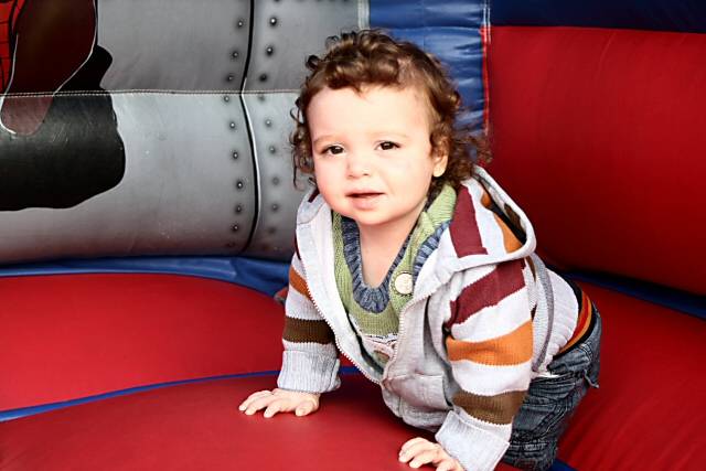 Toddler on the bouncy castle