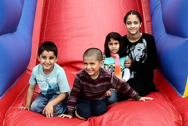 Children at the bottom of the slide