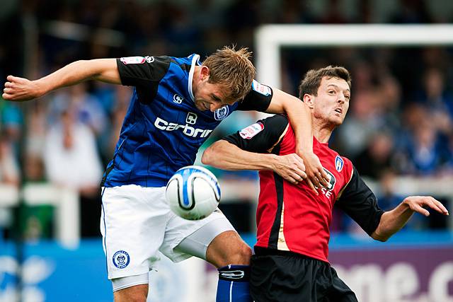 Rochdale 1 - 2 Colchester<br />Craig Dawson wins the ball